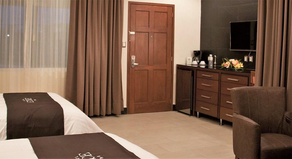 Hotel Ecce Inn & Spa Silao Kültér fotó A typical room at the hotel
