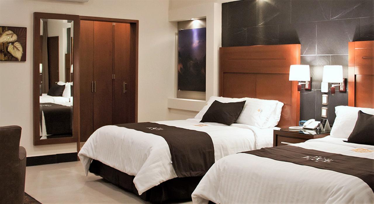 Hotel Ecce Inn & Spa Silao Kültér fotó A room at the hotel